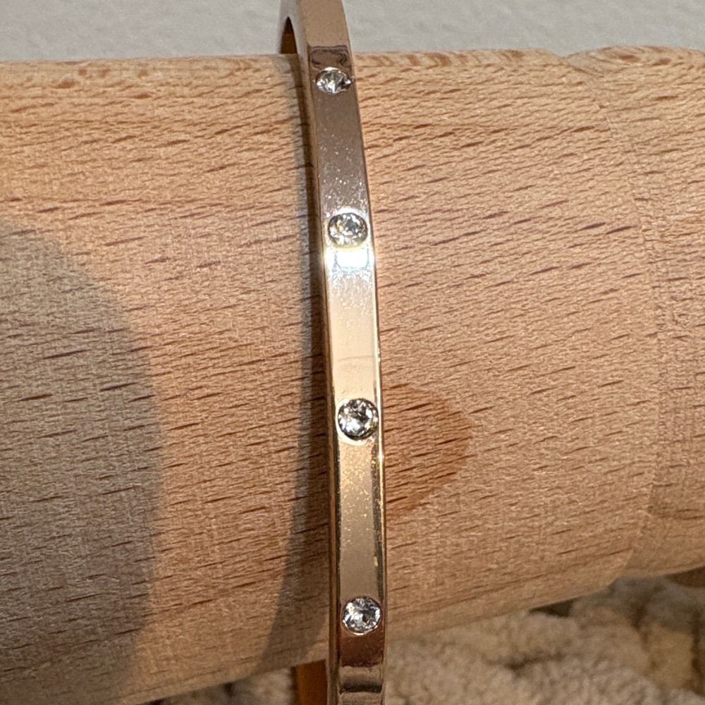 Elegant Gold Bangle with Crystals - Picture 3 of 14